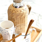 Bamboo Flask and wooden spoon in a breakfast setting