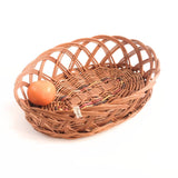 Oval Ring Wicker Basket with fruits.
