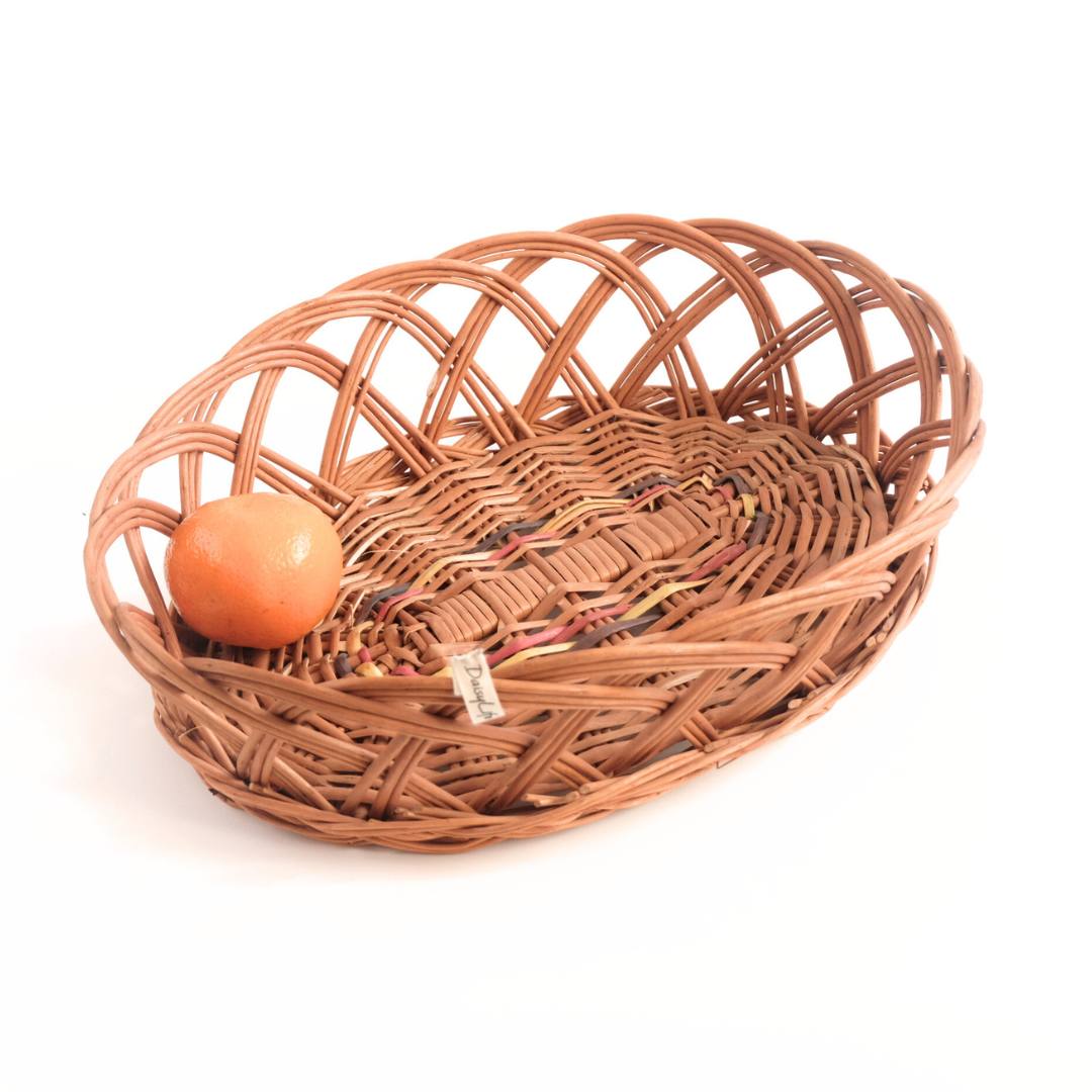 Oval Ring Wicker Basket with fruits.