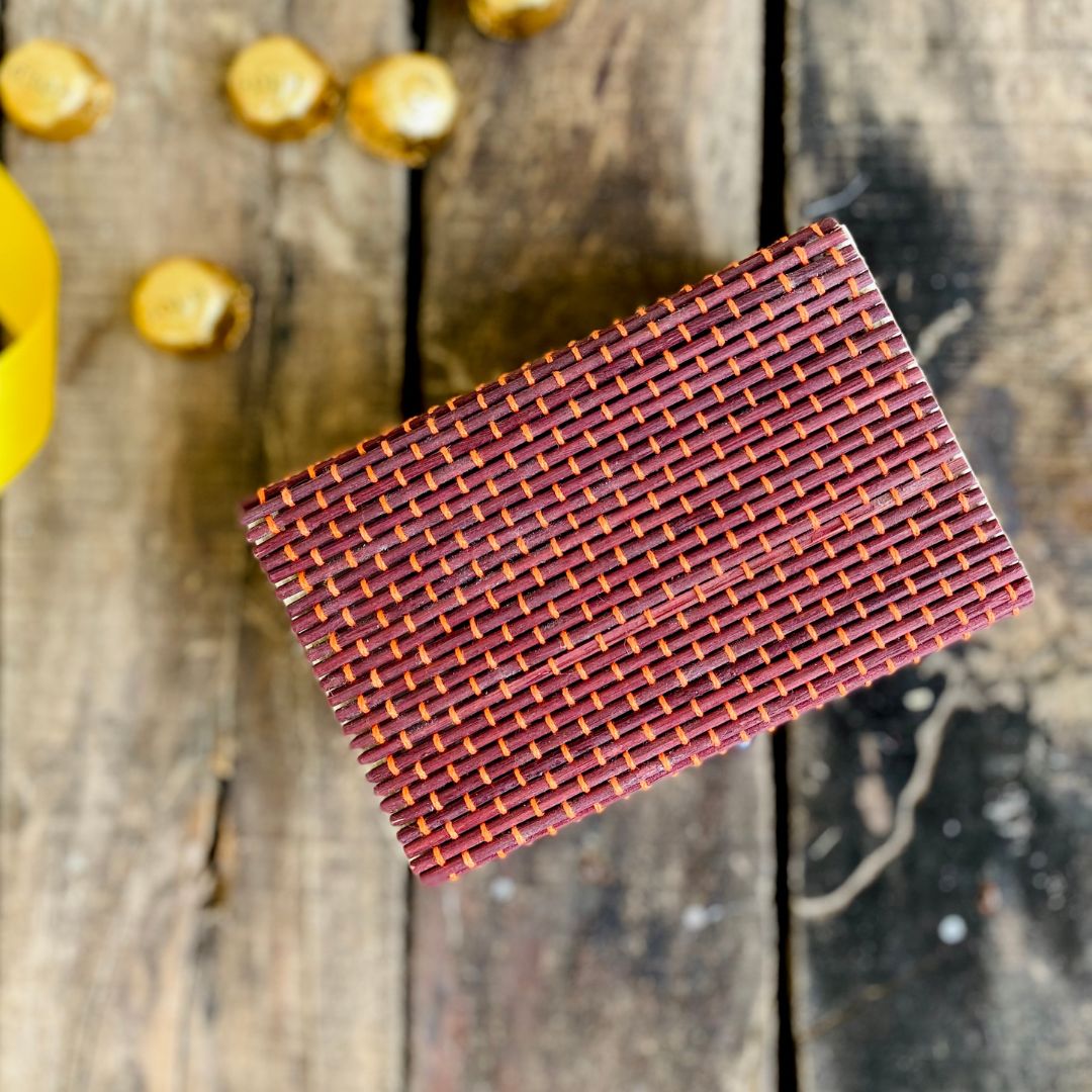 Top shot of Brown gift box with chocolate in background