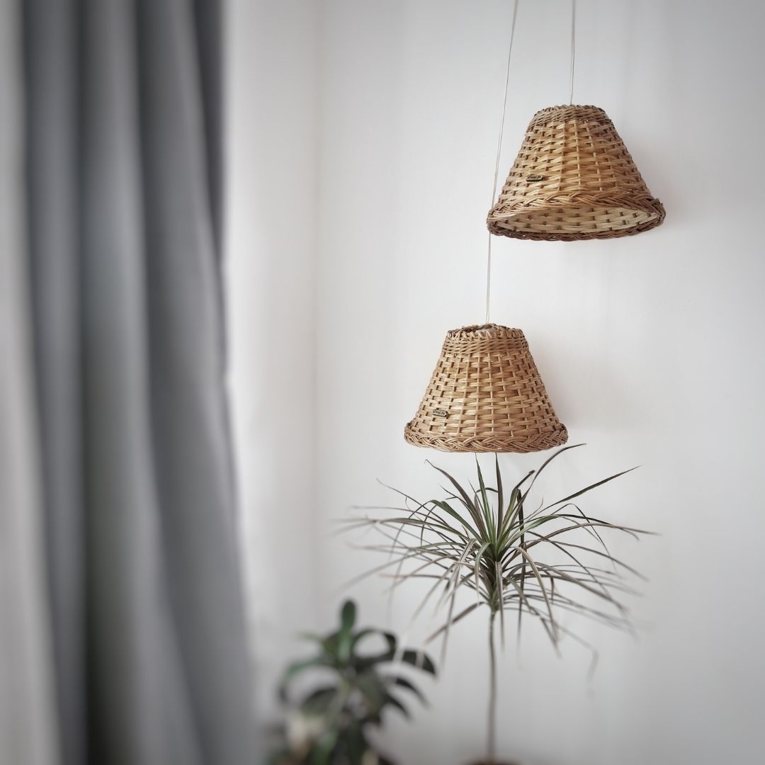 2 wicker handwoven lampshade hung on wall for living room décor. 