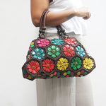 DaisyLife Multi colour 'Dahlia' coconut handbag on model
