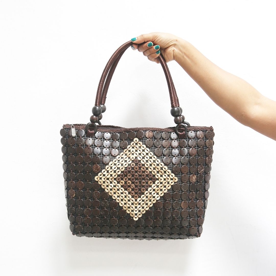 Model holding DaisyLife Coconut natural bags for office and daily use