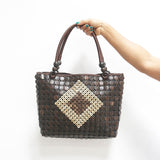 Model holding DaisyLife Coconut natural bags for office and daily use