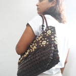 DaisyLife Real coconut shells sling bag on a model