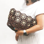 DaisyLife Real coconut shells sling bag on a model