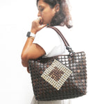 Model holding DaisyLife Coconut natural bags for office and daily use