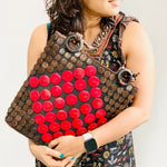 DAISYLIFE Natural and Eco-friendly Fashion Wristlet Purse/Bag - Red and Brown color, casual on model