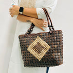 Model holding DaisyLife Coconut natural bags for office and daily use