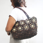 Real coconut shells sling bag on a model