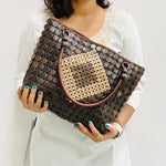 Model holding DaisyLife Coconut natural bags for office and daily use