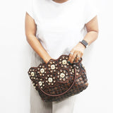 DaisyLife Real coconut shells sling bag on a model