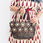 DaisyLife Real coconut shells sling bag on a model