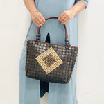 Model holding DaisyLife Coconut natural bags for office and daily use