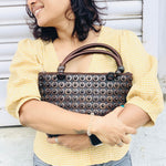 DaisyLife coconut bags as natural fashion on model