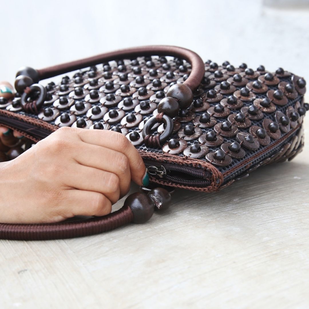 Closeup of DaisyLife coconut bags as natural fashion. A beautiful accessory to add to your outfit.
