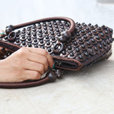 Closeup of DaisyLife coconut bags as natural fashion. A beautiful accessory to add to your outfit.