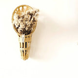 Bamboo flower vase with dry flowers inside