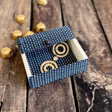 Earring inside Grey gift box