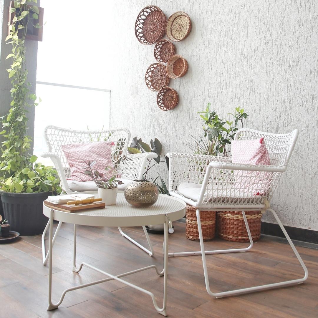 North Star Wall Baskets in gallery with plants in background.
