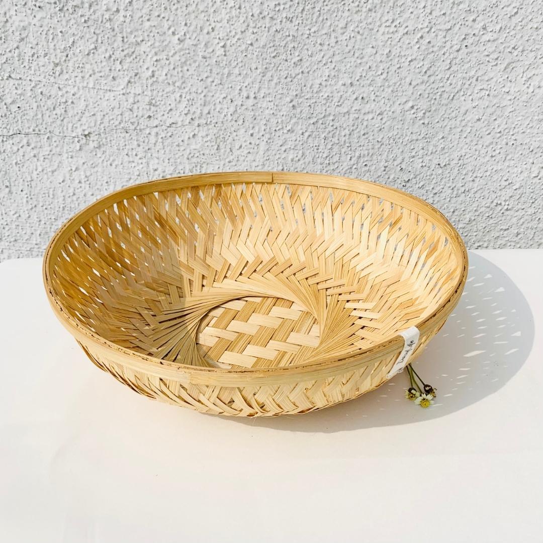 Simple, round, natural multi-purpose bamboo basket