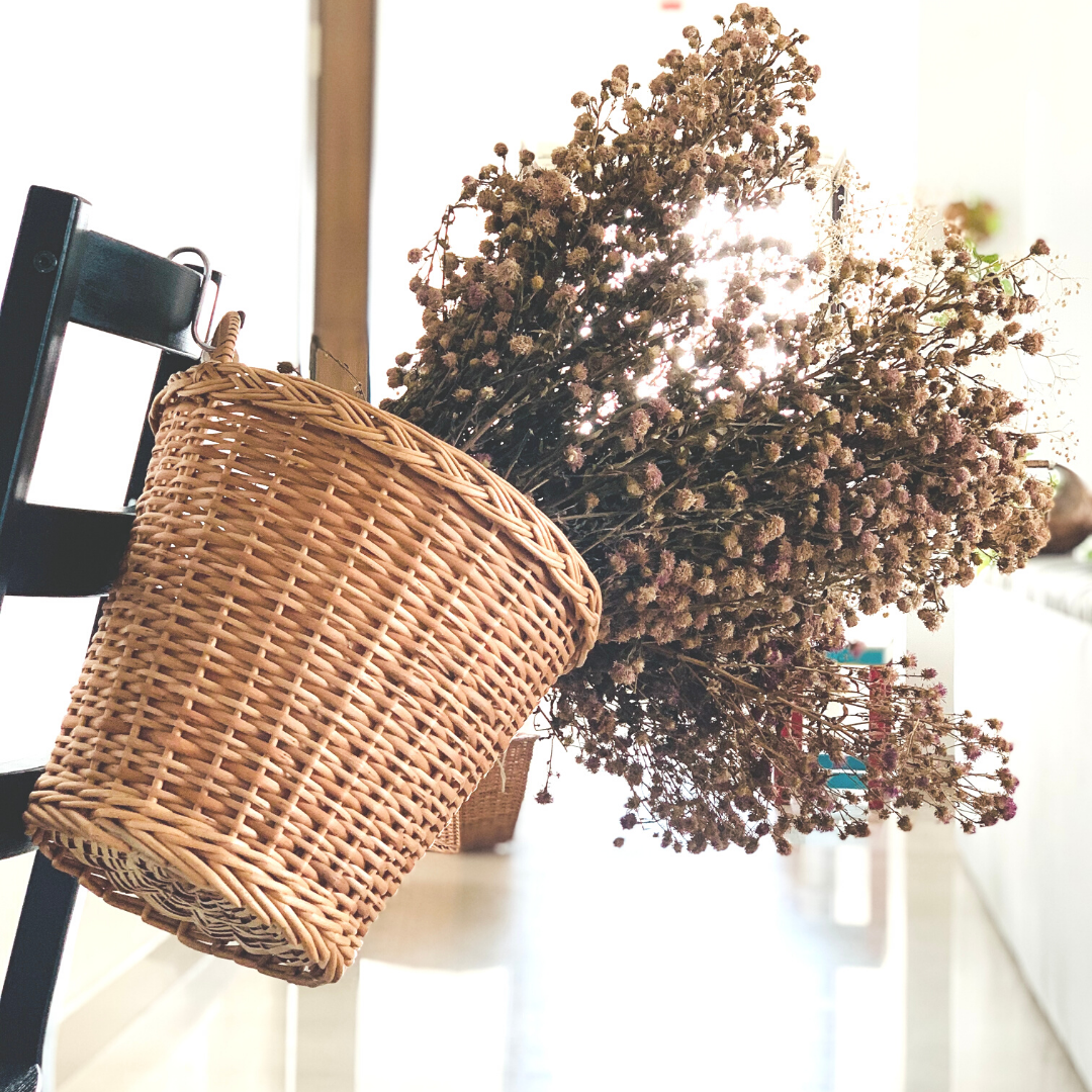 Dry flowers inside Round Hanging Wicker Planter