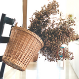 Dry flowers inside Round Hanging Wicker Planter