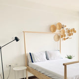 Sea wall decor arrangement in bedroom set up, side view