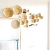 Side view of Sea wall decor arrangement in bedroom set up