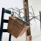 Square Hanging Wicker Planter, hanged on black chair