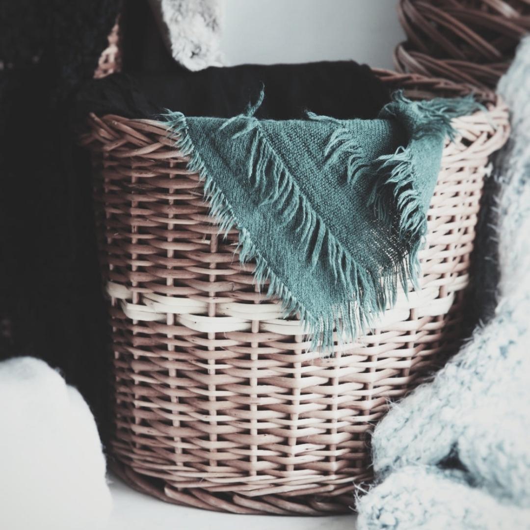 Cloths inside wicker basket