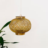 Leaves behind Finely woven natural bamboo lampshade.