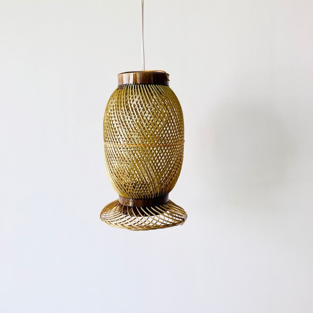 Finely woven natural bamboo lampshade.