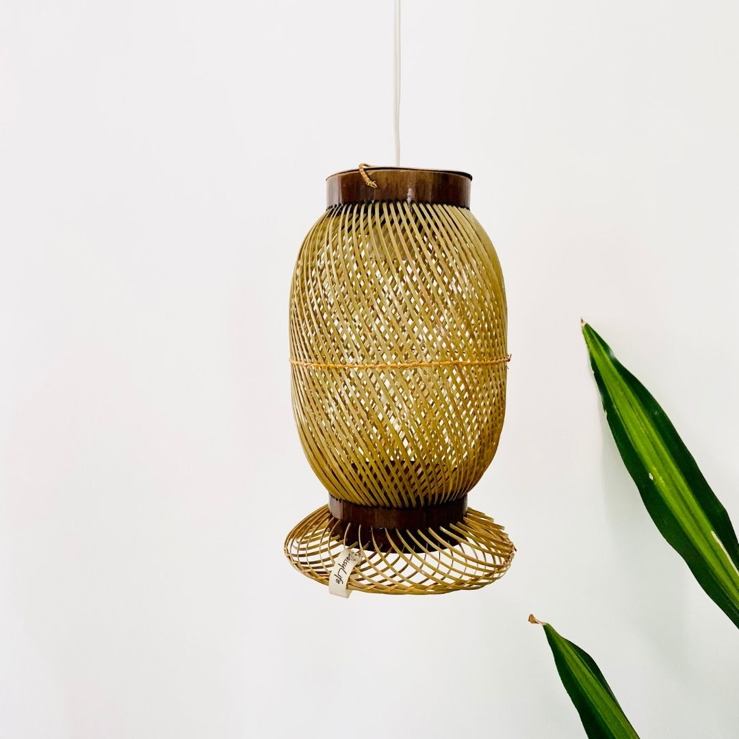 Leaves behind Finely woven natural bamboo lampshade.