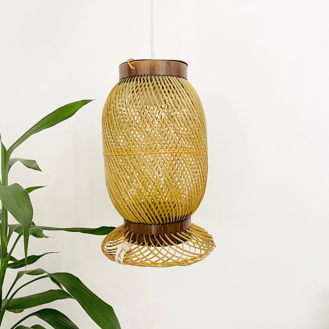 Leaves behind Finely woven natural bamboo lampshade.