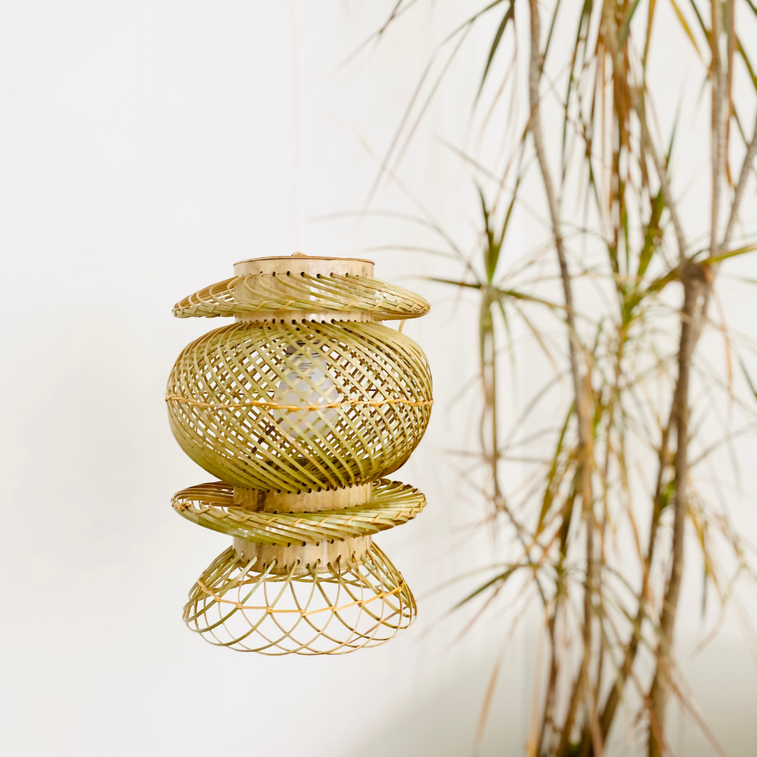 Leaves behind Finely woven natural bamboo lampshade.