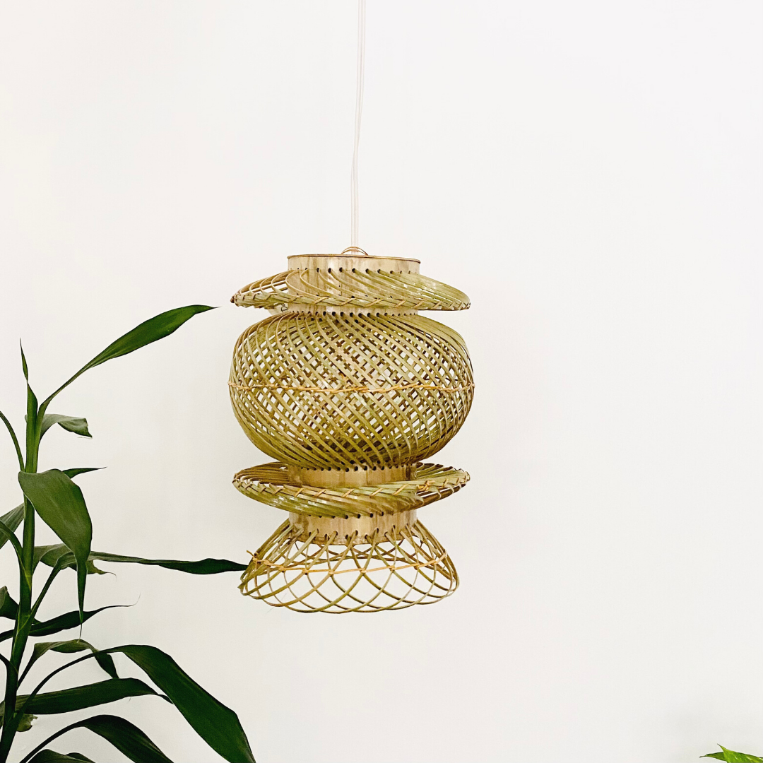 Leaves behind Finely woven natural bamboo lampshade.
