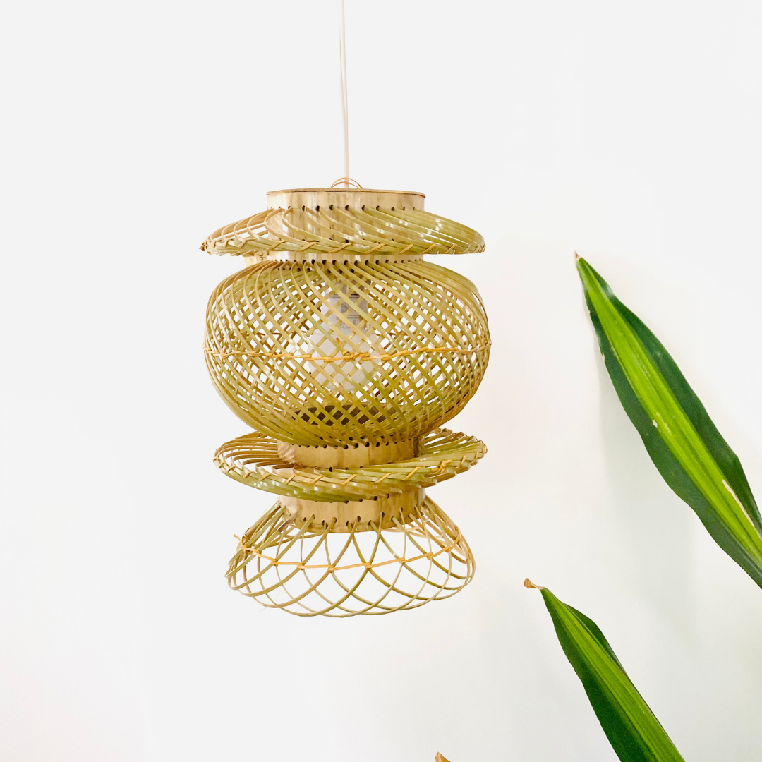 Leaves behind Finely woven natural bamboo lampshade.
