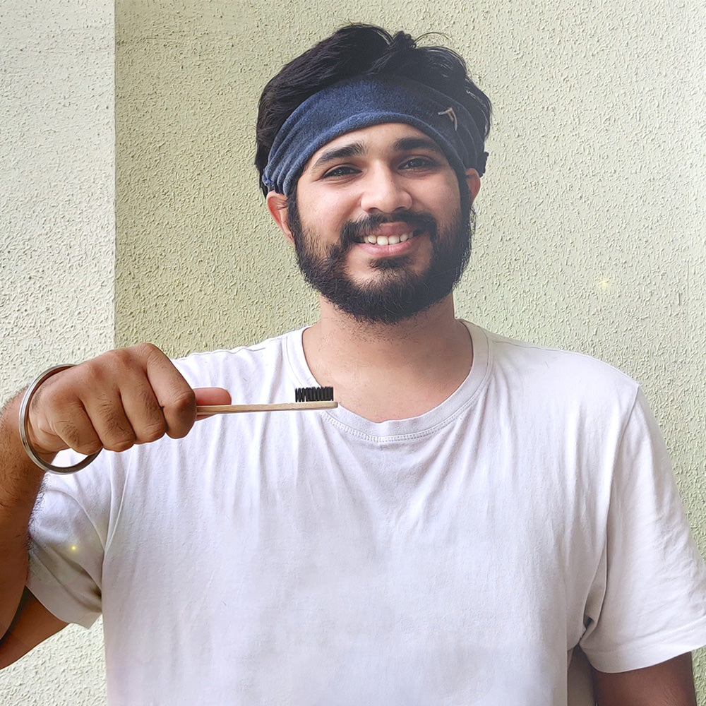 Agrim with his bamboo toothbrush giving tips on how to decompose them