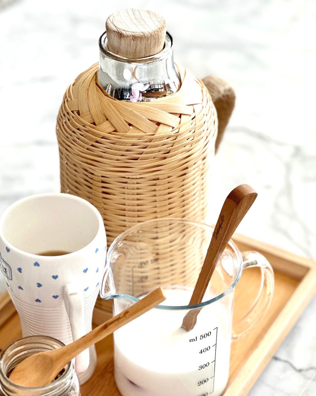 Bamboo Flask and wooden spoon in a breakfast setting