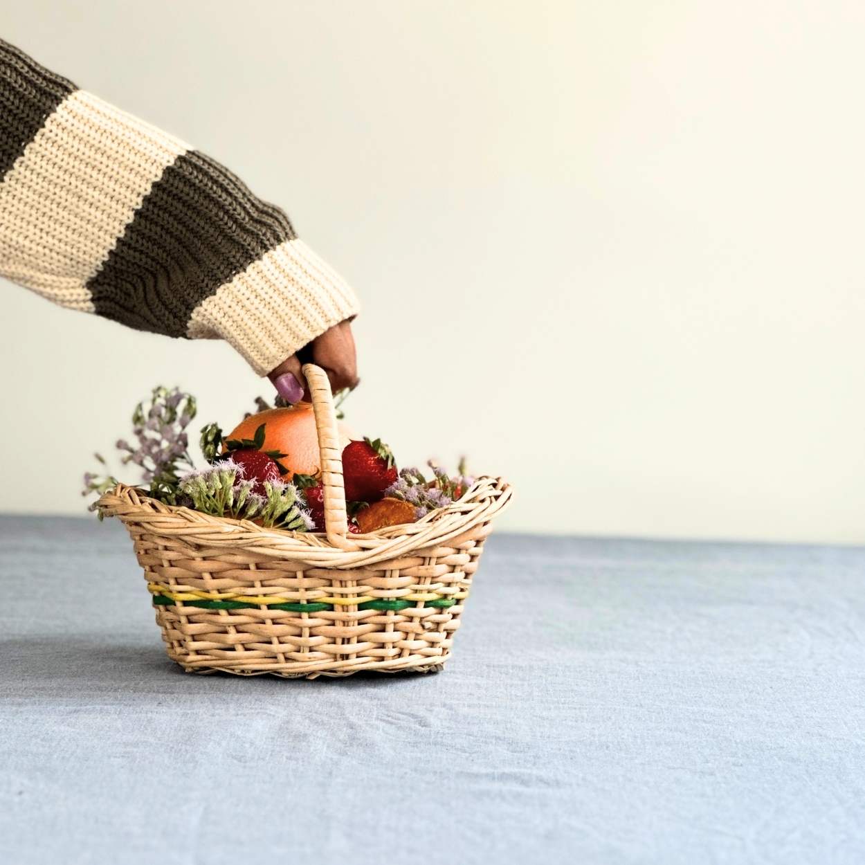 Flower Girl Wicker Basket with flowers and fruits