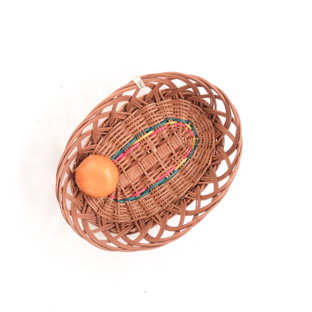 Oval Ring Wicker Basket with fruits.