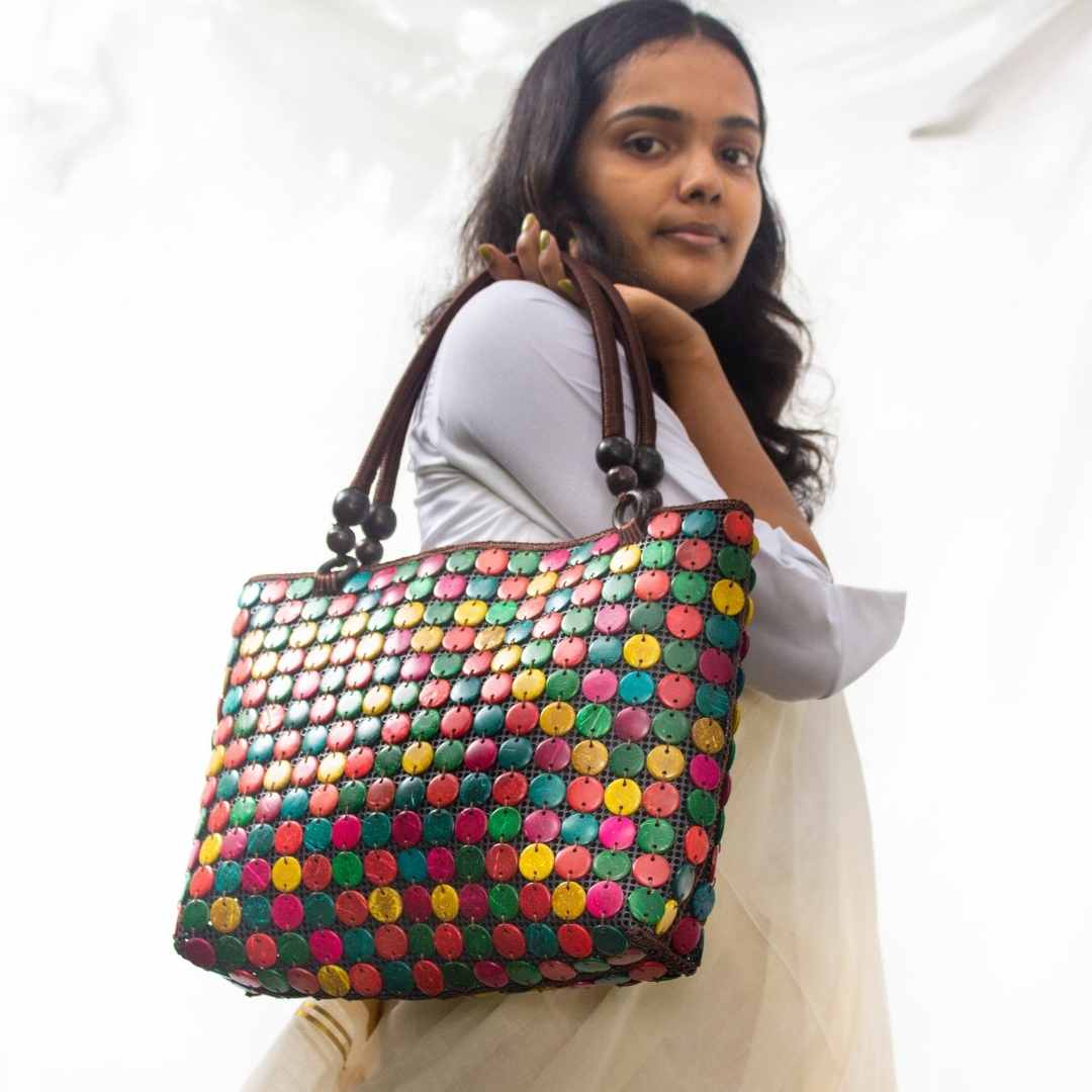 Women carrying natural coconut shell handbag