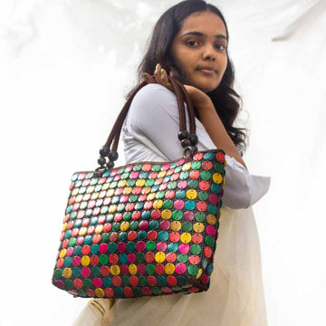 Women carrying natural coconut shell handbag