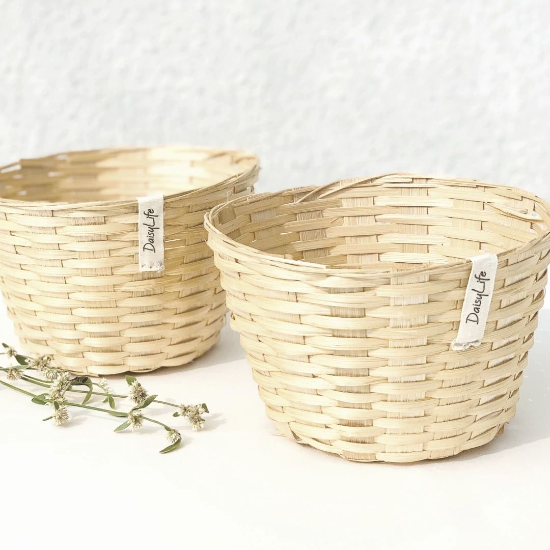 DaisyLife Bamboo Bucket Basket with daisy flower in background 