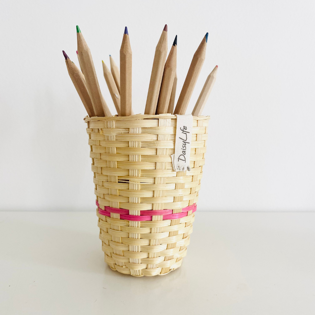 Pencil inside Natural bamboo cup with pink strip