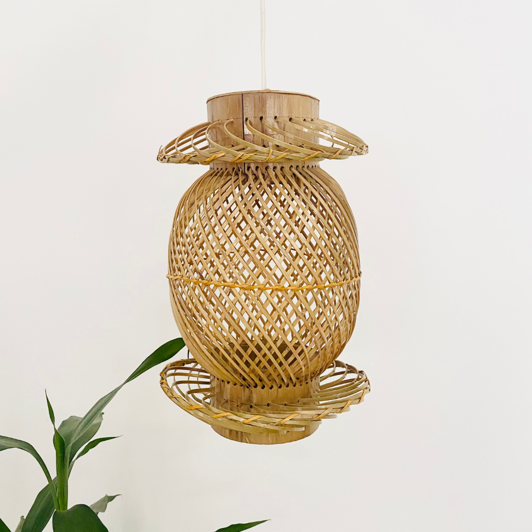Leaves behind Finely woven natural bamboo lampshade.