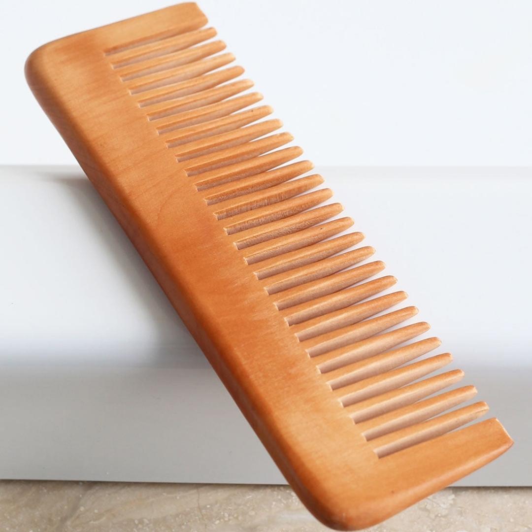 Solid natural wooden combs made from the beech tree.