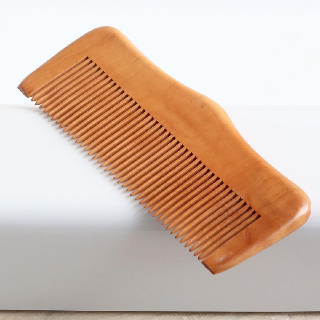 Solid natural wooden combs made from the beech tree.
