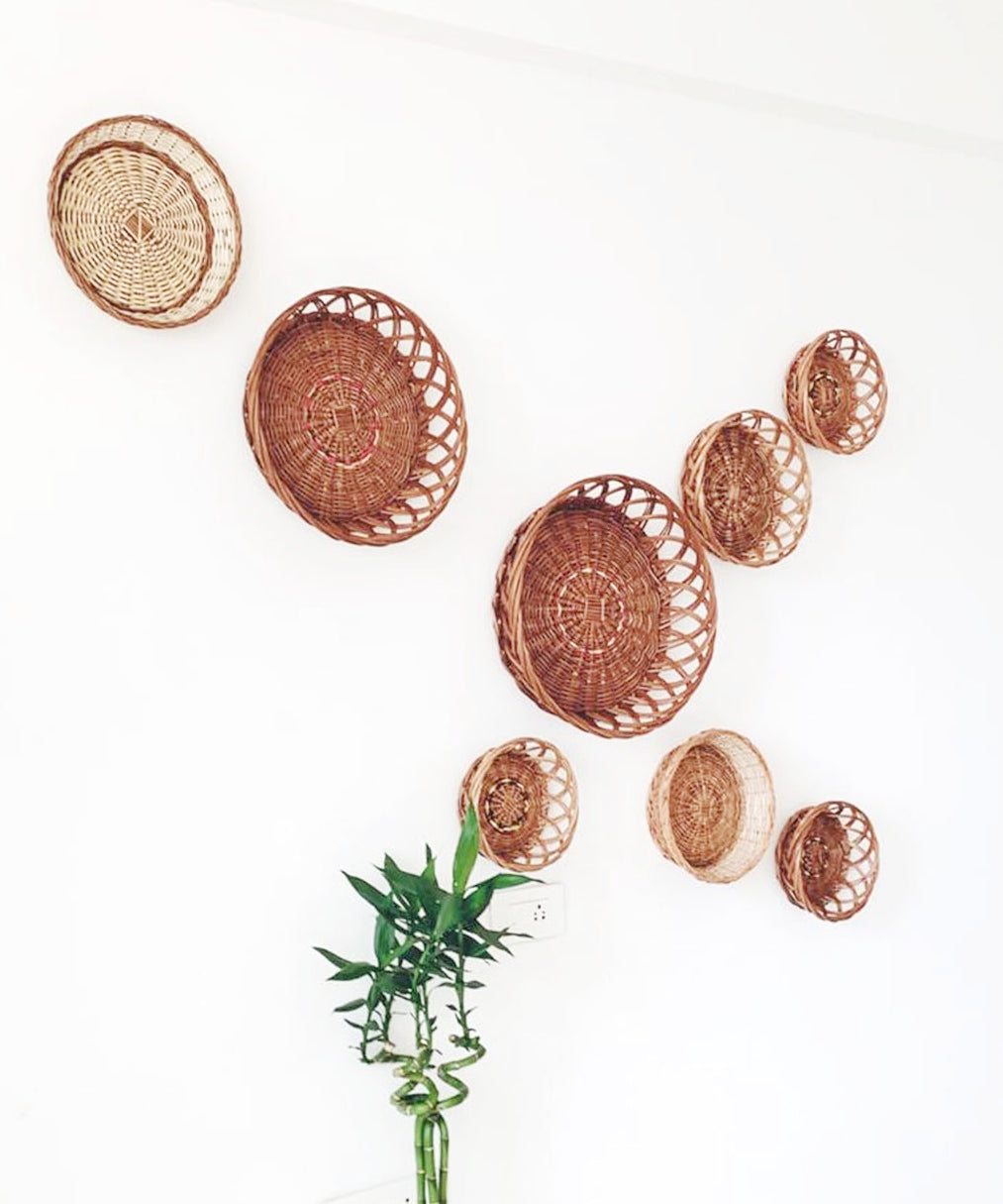 Natural round wicker baskets used for wall installation/ wall décor.